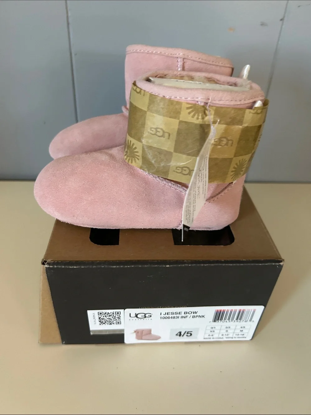 UGG Kids Pink Suede Booties with Bow Detail